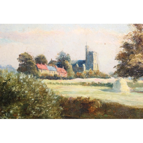 475 - A 19th century oil on canvas landscape of a church by a river, indistinctly signed but dated 1885, i... 