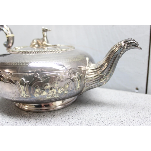 1037 - An impressive 19th century silver plated 4 piece tea set, the teapot and coffee pot with Greyhound t... 