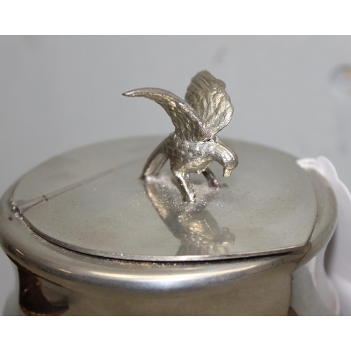 1040 - An antique style polished pewter mounted rams horn table snuff box or snuff mull with eagle finial, ... 