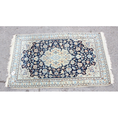 219 - An extremely finely woven Persian Isfahan rug of cream and blue ground, possibly silk, 20th century,... 