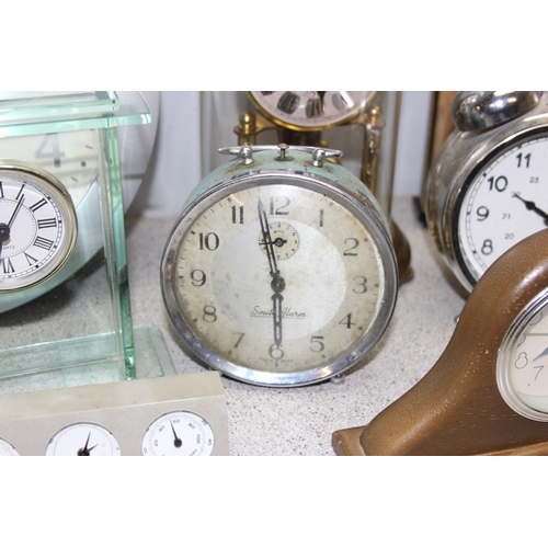 1322 - Qty of clocks to include two vintage Smiths alarm clocks