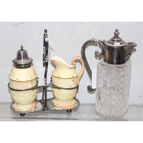 1053 - A silver plated and glass lidded claret jug and a Locke & Co of Worcester jug and sugar shaker on si... 