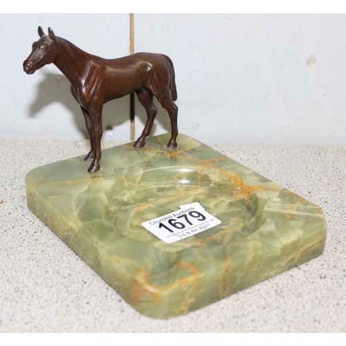 1679 - An early 20th century alabaster ashtray with mounted with a cold painted spelter model of a horse, m... 