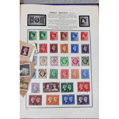 597 - An early 20th century world stamp album and contents to include a number of 19th century stamps