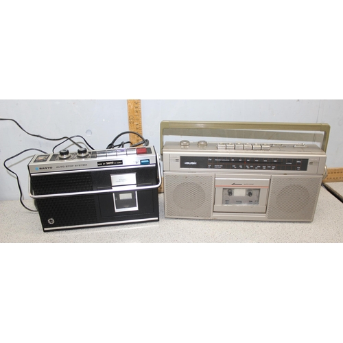 869 - Qty of vintage and modern radios and cassette decks to include Roberts and Sanyo