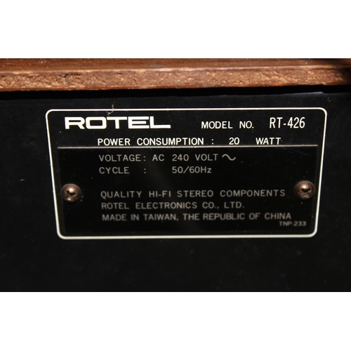 871 - A Rotel stereo tuner RT-426, A pair of Wharfedale Linton 2 speakers and a pair of wall mounted Missi... 