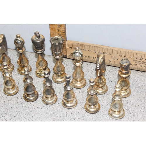 1535 - An unusual good quality gilt metal chess set, the king approx 10.5cm tall