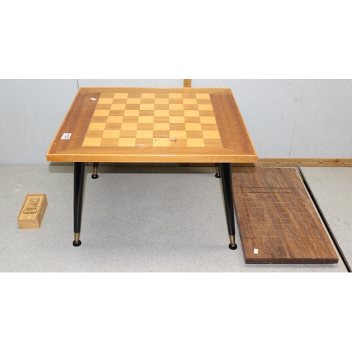 1537 - Vintage chess table, shove ha'penny board and a boxed wooden chess set