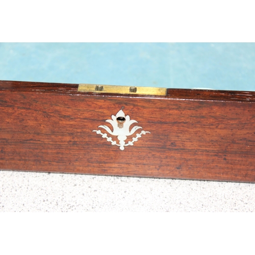 290 - A small antique mahogany workbox with mother of pearl inlay