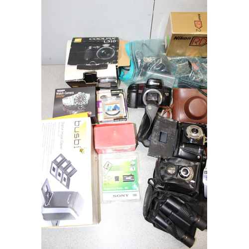 707 - A large box of assorted cameras and a telescope etc