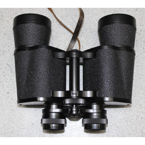 709 - A pair of Carl Zeiss Jenoptem 10x50w binoculars in case