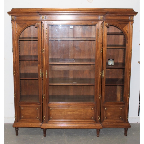 139 - A Late 19th or early 20th century French solid walnut glazed bookcase by Alexandre Hugnet of Paris, ... 