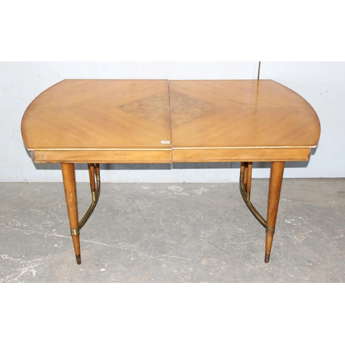 140 - Art Deco style cherry wood extending table with burr veneer centre section and brass leg supports, p... 