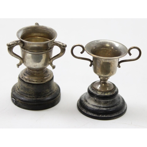 1060 - 2 miniature silver trophies, Birmingham 1907 & 1909, the largest approx 45mm tall inc base