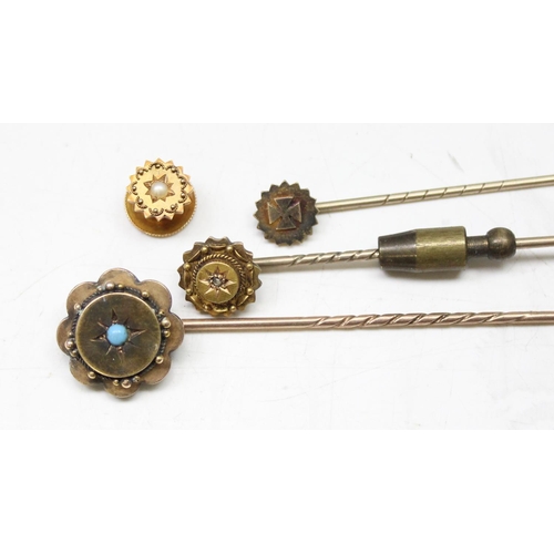 1172 - 3 19th century 15ct gold mounted tie pins and a 15ct gold and seed pearl shirt stud, the tops all 15... 