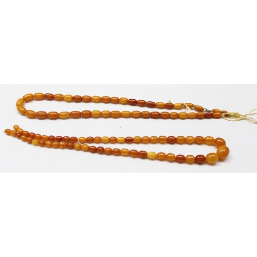 1178 - Qty of assorted loose amber coloured beads, various colours and sizes, the largest bead approx 31mm ... 