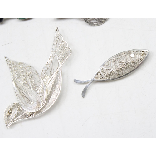 1193 - 6 antique and vintage silver brooches, a silver part Albert chain and a silver and gold plated cruci... 