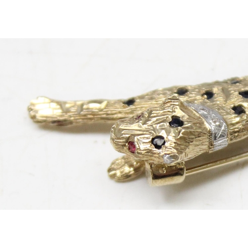 1195 - Retro 9ct gold brooch formed as a leopard set with small blue sapphires and diamond chip collar, mar... 