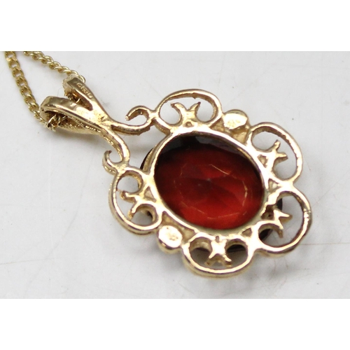 1199A - 9ct gold pink stone set pendant on 9ct gold chain, chain approx 40cm long, approx 2.41g gross