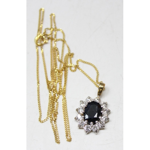 1199B - 9ct gold blue and white stone set pendant on 9ct gold chain, chain approx 46cm long, approx 2.16g gr... 