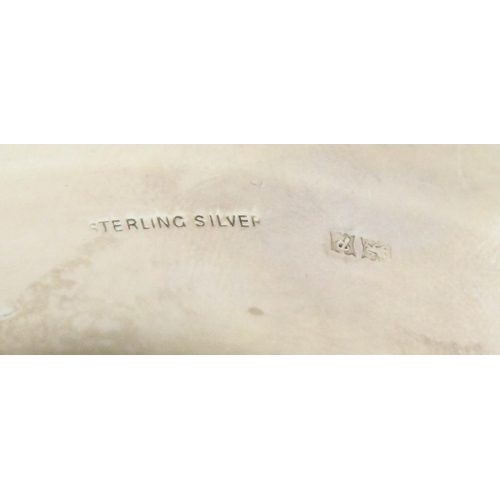 1199E - A vintage Sterling silver cuff bangle with embossed decoration, Birmingham 1964, approx 38.49g gross