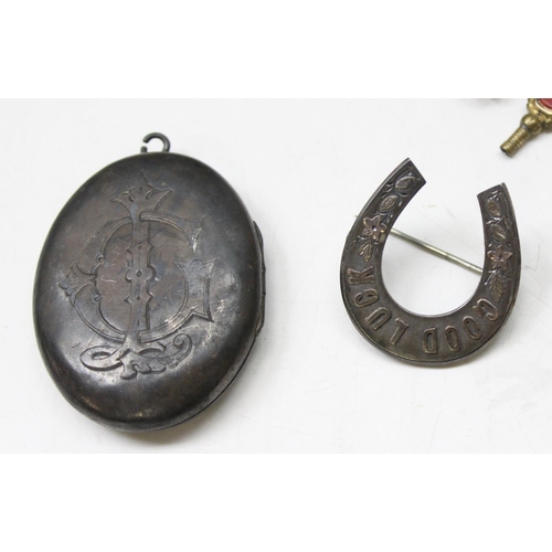 1199J - 3 antique silver broches, a silver locket, all XRF tested and a gilt metal chain with a number of go... 