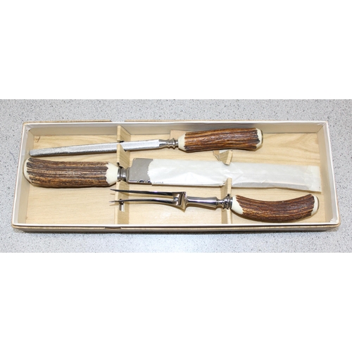 1062 - Boxed stag antler carving set & 2 other sets of boxed flatware