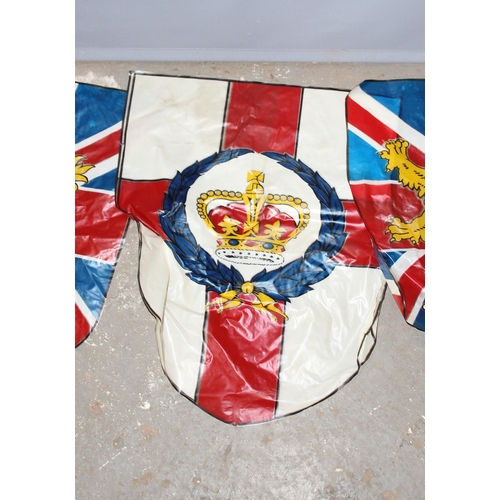 1414A - 10 vintage Union Jack commemorative parade flags on canes