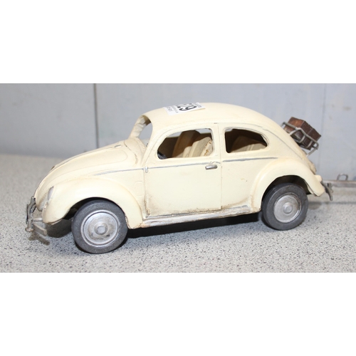 1529 - Vintage model of a Volkswagen Beetle and caravan in tow