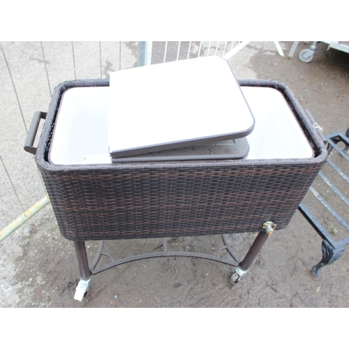 366 - A rattan garden drinks cooler on wheels, approx 86cm wide