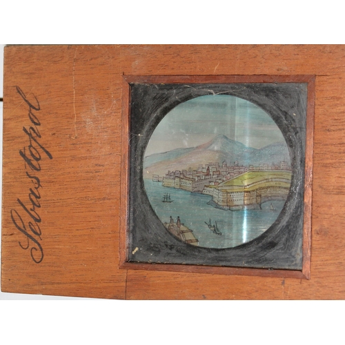 711 - Qty of interesting glass magic lantern slides, some with hand painted detail