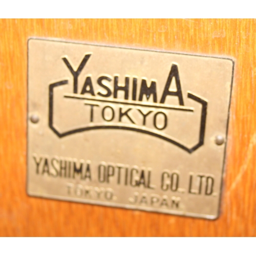 713 - A vintage Yashima of Tokyo binocular microscope in original wooden box