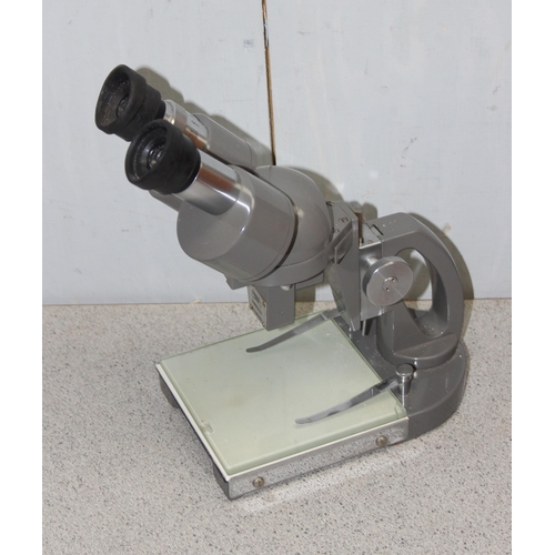 713 - A vintage Yashima of Tokyo binocular microscope in original wooden box