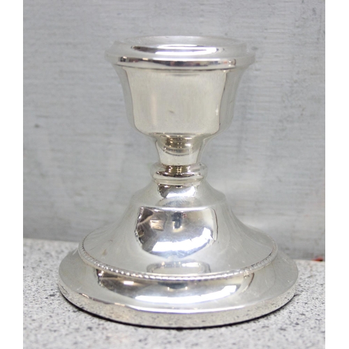 1069 - Pair of weighted sterling silver dwarf candlesticks hallmarked for Birmingham 1965 with rubbed maker... 