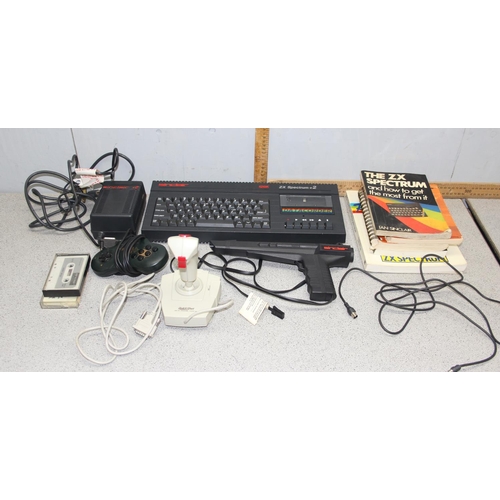 1548 - Sinclair ZX spectrum +2 128k with power lead, phaser gun, joy stick & manuals