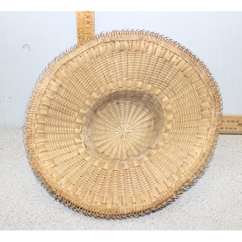 222 - Native America wickerwork - a very unusual late 19th or early 20th century wicker hat bearing the ha... 