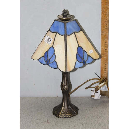 264 - A Tiffany style table lamp with leaded glass shade