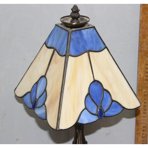 264 - A Tiffany style table lamp with leaded glass shade