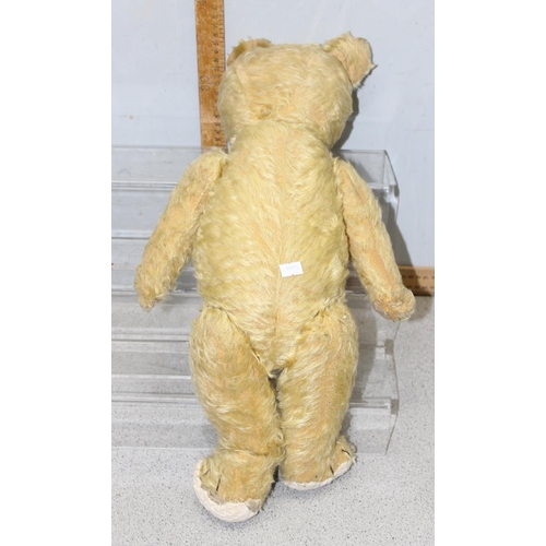 1552 - Qty of vintage toys and games, a vintage teddy bear etc