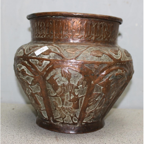 1833 - An interesting Islamic copper jardinière of some age standing approx. 20cm