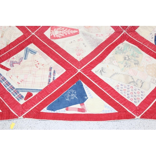 224 - A 19th century patchwork quilt with attached later paper label stating 