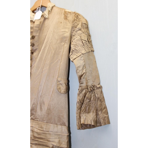 225 - A 19th century dress of small proportions, believed to be silk, hand made, various lace edging