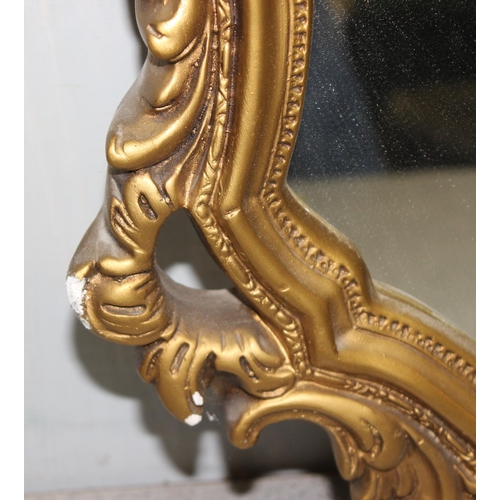 529 - A Rococo style gilt framed mirror approx 70cm tall