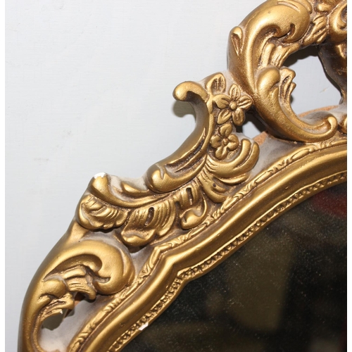 529 - A Rococo style gilt framed mirror approx 70cm tall