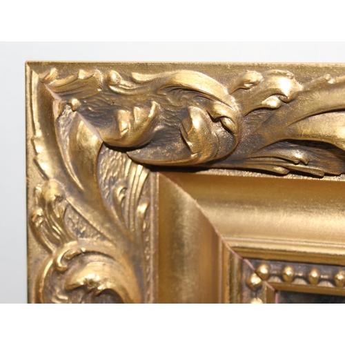 535 - A gilt framed wall mirror, approx 56cm x 46cm