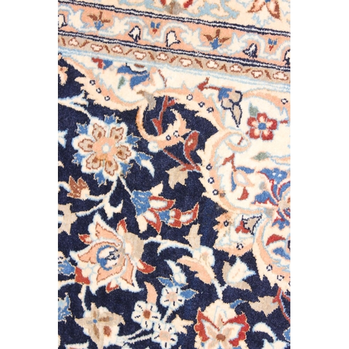 219 - An extremely finely woven Persian Isfahan rug of cream and blue ground, possibly silk, 20th century,... 