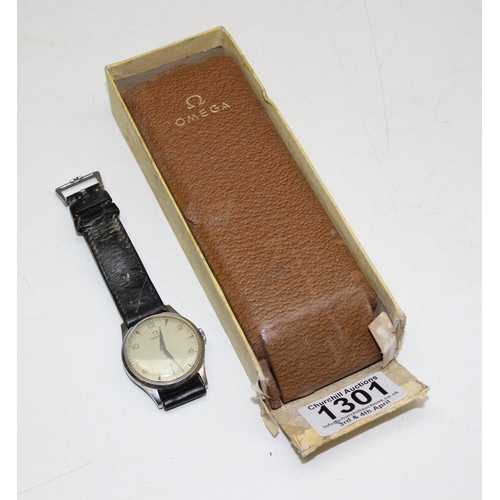 1301 - A 1950's Omega wristwatch in stainless steel case, the dial with baton odd numerals and even Arabic ... 