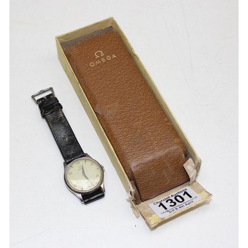 1301 - A 1950's Omega wristwatch in stainless steel case, the dial with baton odd numerals and even Arabic ... 