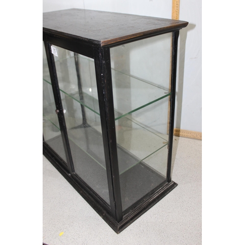 157 - A vintage glazed table top display case with 2 glass shelves, approx 65cm x 65cm x 32cm, ideal for a... 