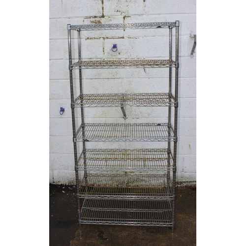 165 - A metal wire racking shelf with 7 shelves, approx 185cm x 90cm wide